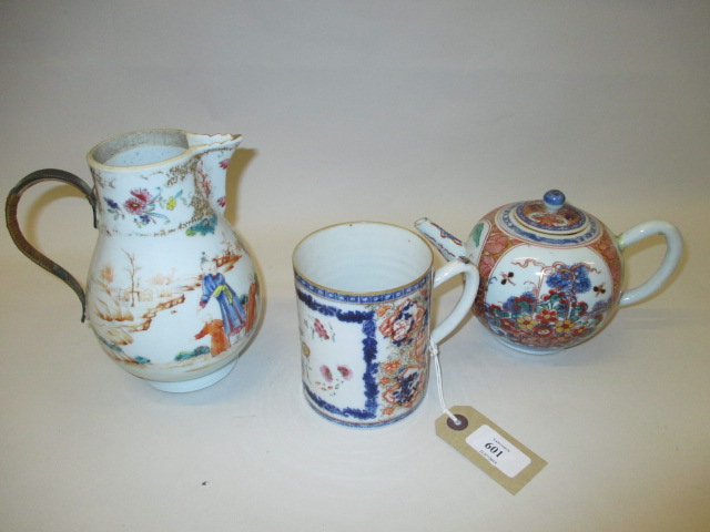 Chinese Imari coloured mug with floral enamel decoration together with a similar teapot and a 19th
