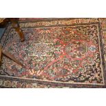 Large Persian style rug with hooked medallion and multiple borders, and another smaller,