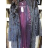 Ladies three quarter length fur coat