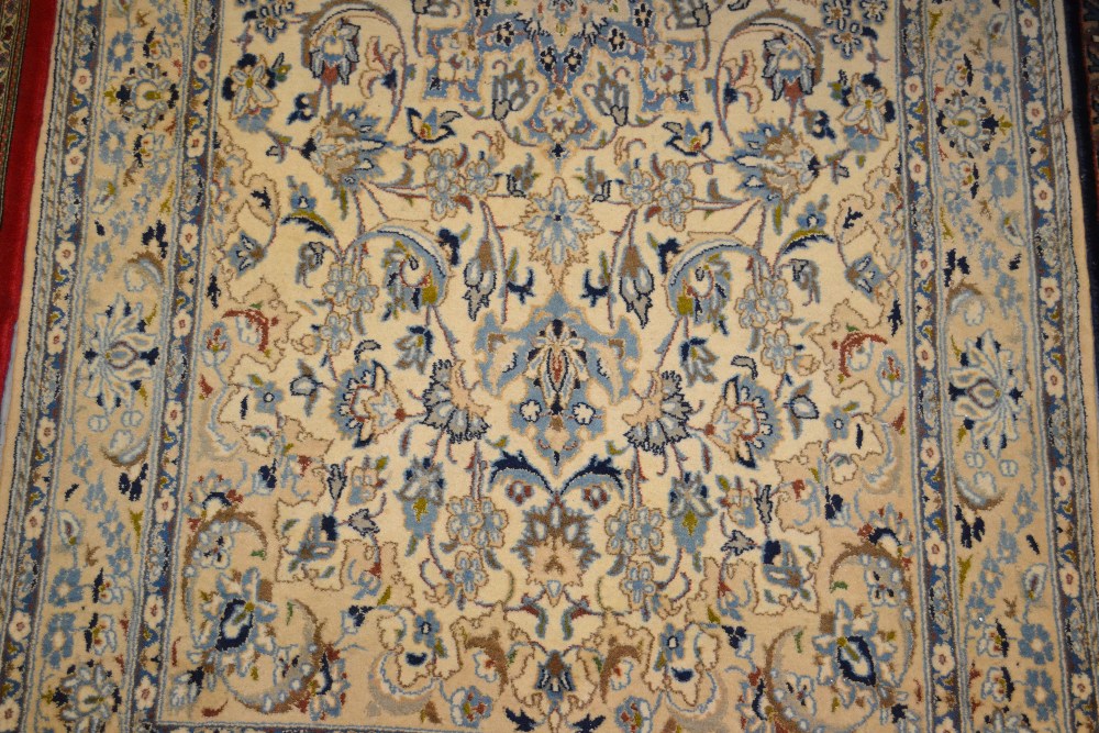 Modern central Persian rug with medallion and all-over floral design on an ivory ground with
