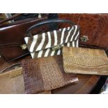 Six various ladies animal skin handbags