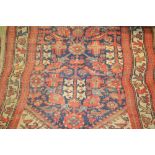 Hamadan runner with Herati design on blue ground (worn) together with a small Belouch rug (worn)