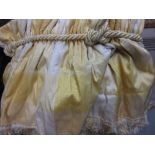 Two pairs of yellow and white shot silk curtains with pelmets