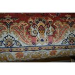 Persian pattern machine made carpet together with a woollen carpet