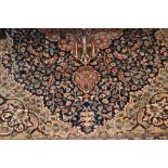 Indo Persian rug with medallion and all-over stylised floral design in shades of pink,