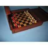 Early 20th Century mahogany cased travelling chess set
