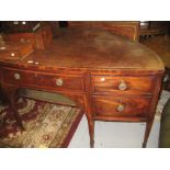 Unusual George III bow backed sideboard with a centre drawer above a tambour alcove flanked by