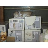 Group of four boxed Lladro figures, dogs,