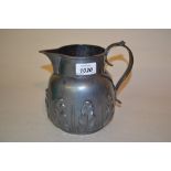 Victorian silver water jug of baluster form relief decorated with acanthus leaves below a scroll