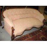 Victorian button upholstered three seat sofa on cabriole front supports with casters