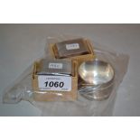 Pair of boxed silver napkin rings with engine turned decoration, Birmingham 1982,