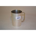 Silver mug of plain tapering form,