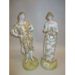 Pair of French bisque porcelain figures of lady and gallant with gilded decoration