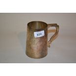 London silver mug of plain tapering form with shaped handle