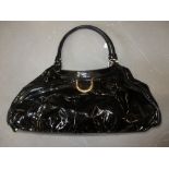 Gucci black patent leather handbag