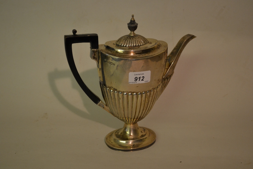 Sheffield silver pedestal hot water pot with half gadroon decoration, makers mark W.G.J.L.