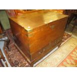 Good quality 19th Century teak and brass bound trunk with hinged cover above two drawers on low