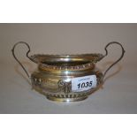 Sheffield silver oval two handled sugar bowl decorated with ribbons,