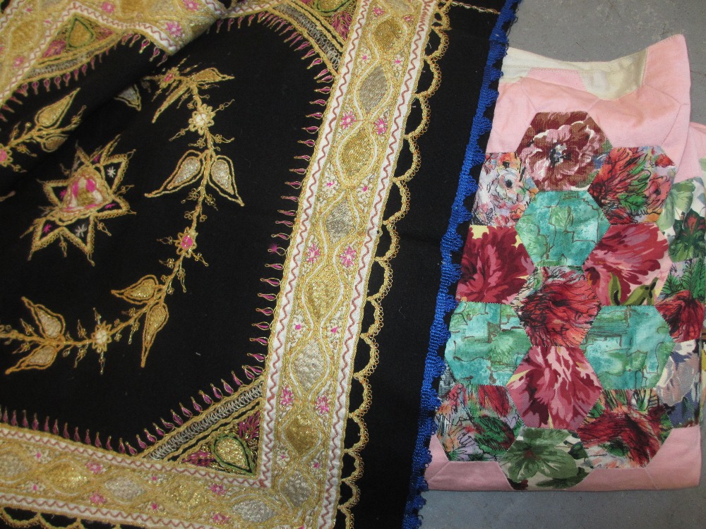 Large patchwork quilt together with a Burmese gold thread embroidered table cover