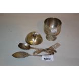 Continental engraved beaker together with two Georgian silver teaspoons,