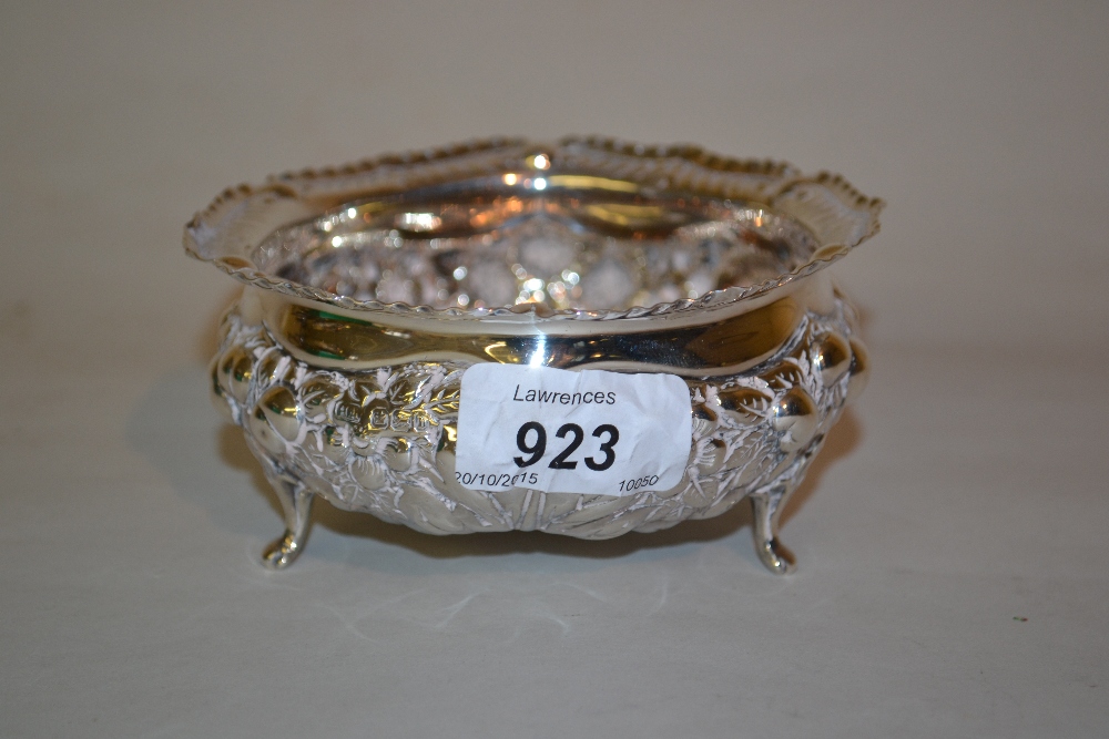 Sheffield silver bowl of embossed floral design on three shaped supports