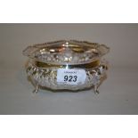 Sheffield silver bowl of embossed floral design on three shaped supports