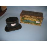 Early 20th Century tin plate money box in the form of a top hat together with a Huntley and Palmers