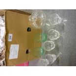 Box containing a large quantity of various Edwardian cut glass drinking glasses,