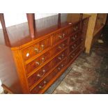 Good quality reproduction yew wood nine drawer chest with brass handles