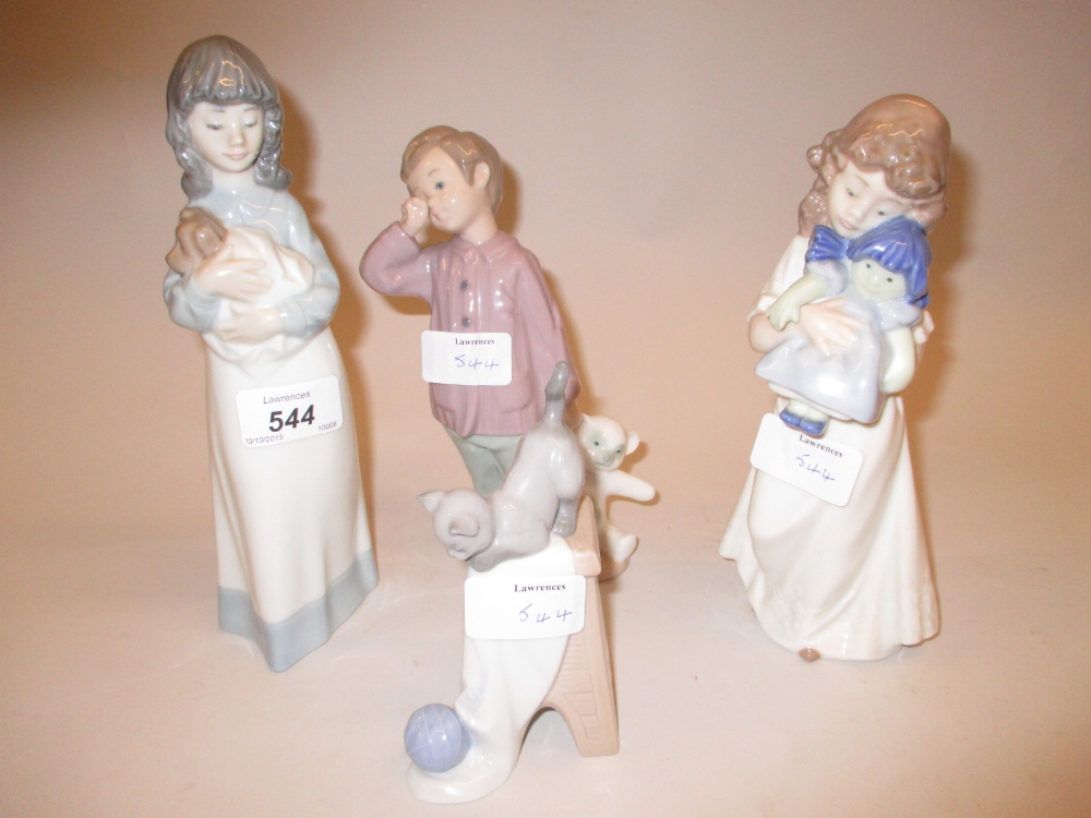 Four various Nao porcelain figures