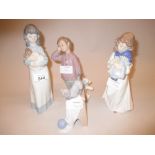 Four various Nao porcelain figures
