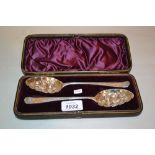 Cased pair of George III silver berry spoons, London 1790, maker G.