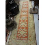 Turkish runner of hook medallion design with multiple borders, 2.8m x 0.