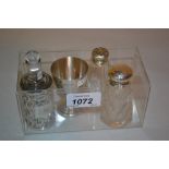 Small silver mounted cut glass perfume bottle, another similar,