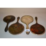 Group of four 1920's silver and tortoiseshell hand mirrors (one a/f)
