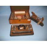 Oak cased medical box containing a quantity of various bottles, scales etc,