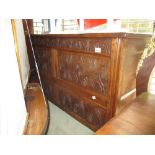 18th Century fruitwood mule chest having hinged cover with panelled front and two short drawers on