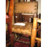 Antique oak side chair with brass studded leather back and seat on turned supports with stretchers