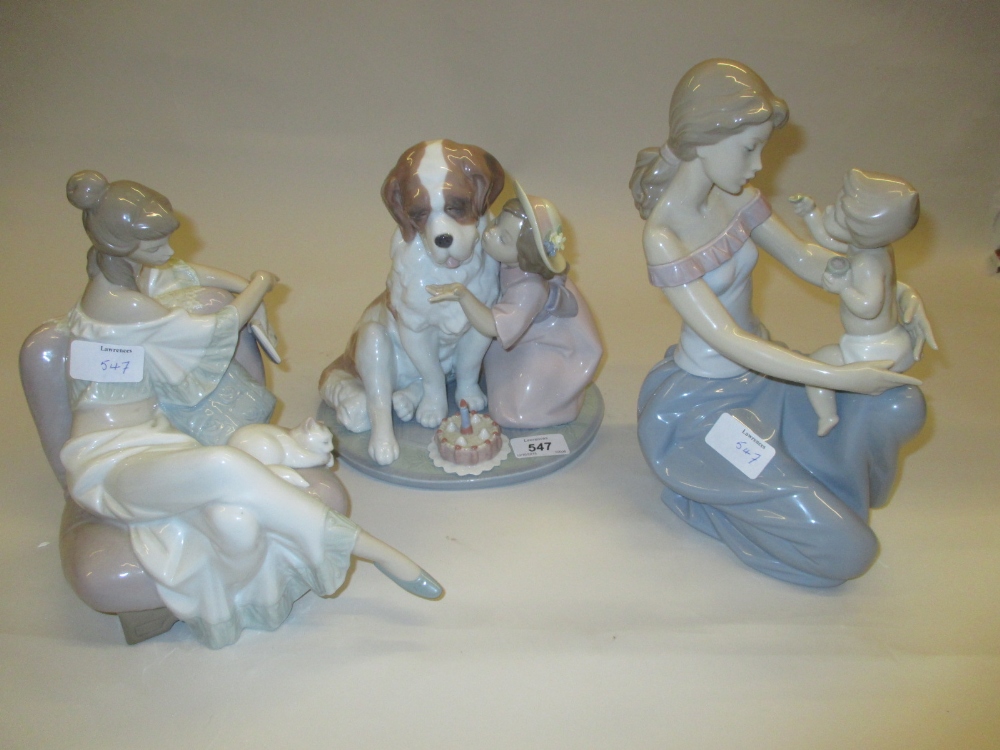 Three large Lladro figures, a reclining lady, a girl with a St.