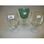 Pair of 20th Century Caithness glass goblets each etched with birds,