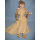 19th Century Continental papier mache and wax shoulder plate doll