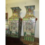 Pair of large Canton style square porcelain vases decorated with figures and flowers