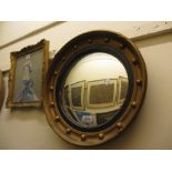 Circular gilt convex mirror together with a pierced brass fender