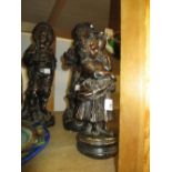 Group of three 19th Century bronzed plaster figures of a young girl and fishermen and woman