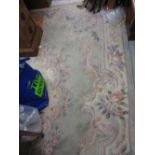 Chinese woollen carpet of all-over floral design,