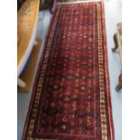 20th Century Hamadan runner with all-over Herati design on a red ground with borders