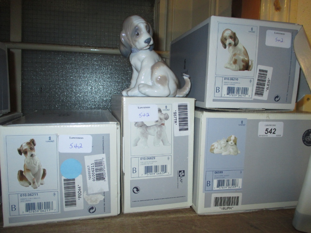 Group of four boxed Lladro figures,