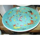 20th Century Chinese Canton deep dish decorated with insects on a blue ground,