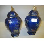 Pair of Carltonware (W & R mark) hexagonal baluster form vases with covers,