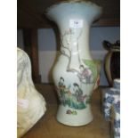 Chinese famille rose baluster form vase decorated with figures in landscapes